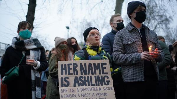 One mourner carries a placard that reads <em></em>'her name is Ashling<em></em>' outside the Lo<em></em>ndon Irish Centre