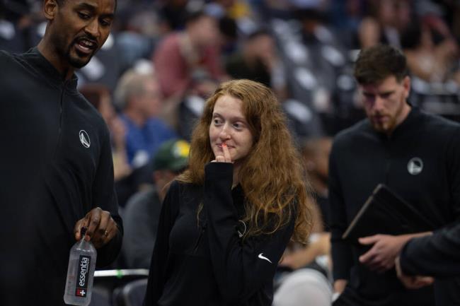 Warriors assistant coach Hannah Heiring stands courtside during a July 23 Summer League game in Sacramento. (Jose Carlos Fajardo / SAN JOSE MERCURY NEWS)